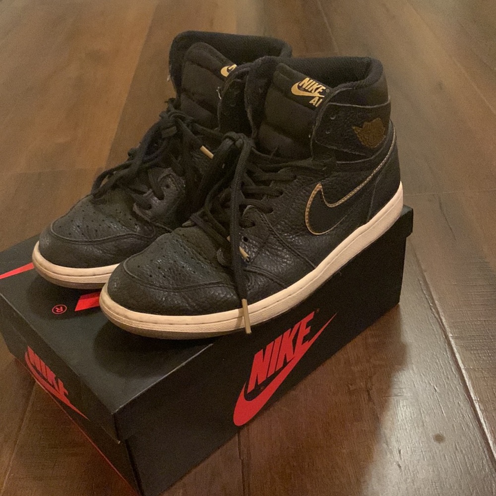 Air Jordan 1s “City of Flight” Black and Gold